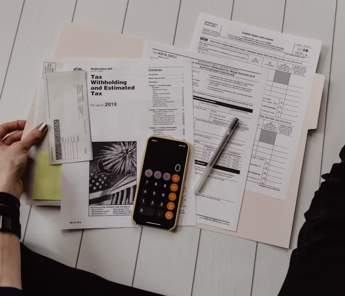 Financial paperwork with a calculator